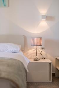 Postel nebo postele na pokoji v ubytování Apartments Lea