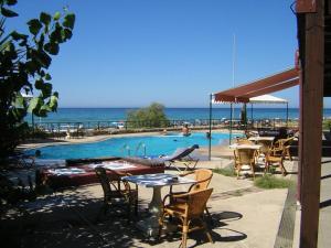 Sundlaugin á Aqua Seafront Glyfada Corfu Beach House With Garden eða í nágrenninu