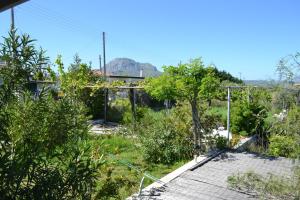 Vonkajšia záhrada v ubytovaní Corinthian Sun - Vacation Home