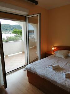 En eller flere senge i et værelse på Tomulić Jasna i Miljenko