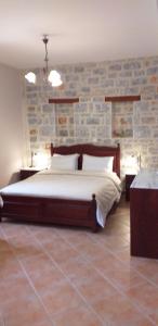 Voodi või voodid majutusasutuse Traditional Apartments Plagiaki toas
