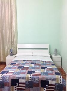 Un pat sau paturi într-o cameră la Florenceunita