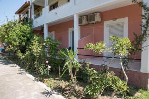 A garden outside Maro Apartments Arillas Corfu
