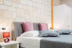 Posteľ alebo postele v izbe v ubytovaní Apartman Arbol