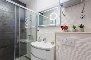 Kúpeľňa v ubytovaní Apartman Arbol + 25 fotografií