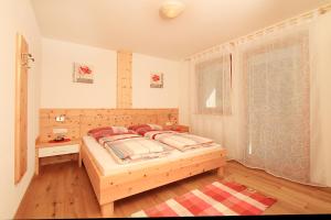 Posteľ alebo postele v izbe v ubytovaní Appartements Sonnenschein