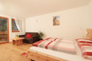 Posteľ alebo postele v izbe v ubytovaní Appartements Sonnenschein