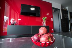 A kitchen or kitchenette at PR1MO Apartmanok