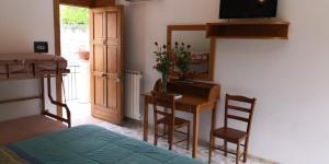 Kuchyň nebo kuchyňský kout v ubytování Villaggio "Camping Pompei" Bungalow