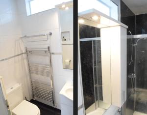 a bathroom with a shower and a toilet and a sink at Nottingham City House in Nottingham +12 photos