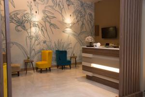 TV a/nebo společenská místnost v ubytování Hotel Commercio