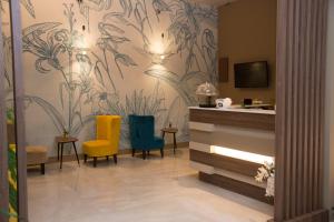 TV a/nebo společenská místnost v ubytování Hotel Commercio