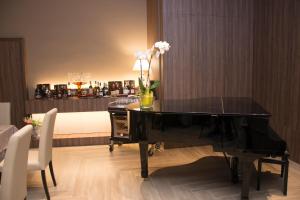 Nápoje v ubytování Hotel Commercio
