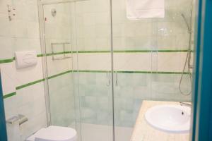 Koupelna v ubytování Hotel Commercio
