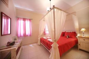 Postel nebo postele na pokoji v ubytování Sfakia Thea Apartments