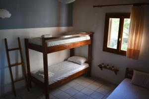 Postel nebo postele na pokoji v ubytování Poseidon Apartments
