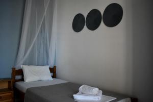 Postel nebo postele na pokoji v ubytování Poseidon Apartments