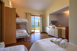 Postel nebo postele na pokoji v ubytování Maison Balù Apartments + 53 fotografií