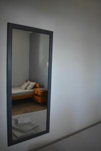 Postel nebo postele na pokoji v ubytování Poseidon Apartments
