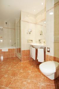 a bathroom with a toilet and a sink at Hotel Meridijan in Pag