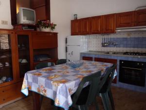 Kuchyň nebo kuchyňský kout v ubytování Dammuso delle scale