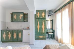 A kitchen or kitchenette at Stefanis House
