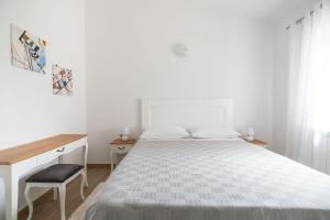 Posteľ alebo postele v izbe v ubytovaní Apartments Norma