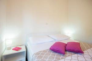 Postel nebo postele na pokoji v ubytování Apartments CAPE Deluxe