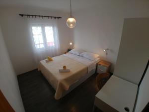 Postel nebo postele na pokoji v ubytování Apartmani Sali Seaview