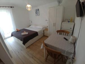 Postel nebo postele na pokoji v ubytování Apartmani Sali Seaview