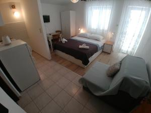 Postel nebo postele na pokoji v ubytování Apartmani Sali Seaview