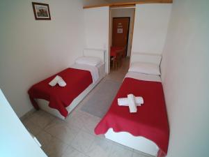 Postel nebo postele na pokoji v ubytování Apartmani Sali Seaview
