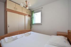 Krevet ili kreveti u jedinici u okviru objekta Apartment Put Slanice in Murter
