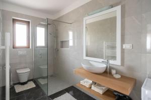 Kúpeľňa v ubytovaní Apartments Norma + 30 fotografií