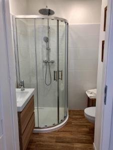 Kúpeľňa v ubytovaní Apartament Poznańska24
