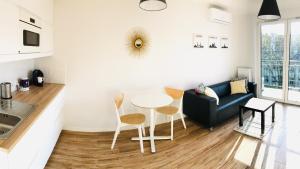 Posedenie v ubytovaní Apartament Poznańska24