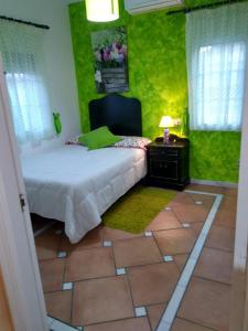 Postel nebo postele na pokoji v ubytování Habitaciones en Casa Céntrica con piscina