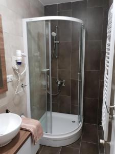 Koupelna v ubytování Tvoj Apartman + 12 fotografií