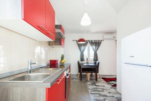 Kuchyň nebo kuchyňský kout v ubytování Apartments CAPE Deluxe