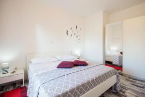 Postel nebo postele na pokoji v ubytování Apartments CAPE Deluxe