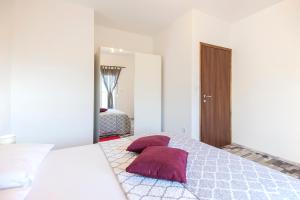 Postel nebo postele na pokoji v ubytování Apartments CAPE Deluxe