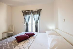 Postel nebo postele na pokoji v ubytování Apartments CAPE Deluxe