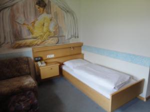 Voodi või voodid majutusasutuse Hotel Saxl toas +37 fotot