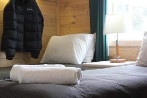 Letto o letti in una camera di Sponars Chalet