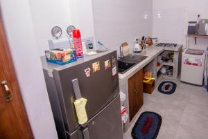 A kitchen or kitchenette at Seeya's Villa, your Home away from Home