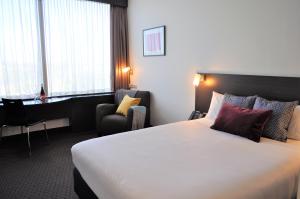Postel nebo postele na pokoji v ubytování ibis Melbourne - Glen Waverley