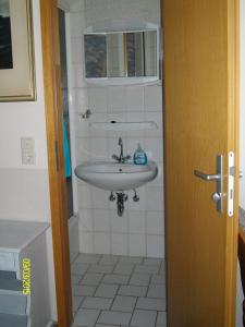 Et badeværelse på Gästehaus Hemmerdeich-alte Schule