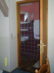 Et badeværelse på Gästehaus Hemmerdeich-alte Schule