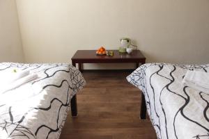 Letto o letti in una camera di Snow Leopard Hostel