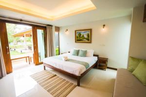 Anyamanee Resort客房内的一张或多张床位